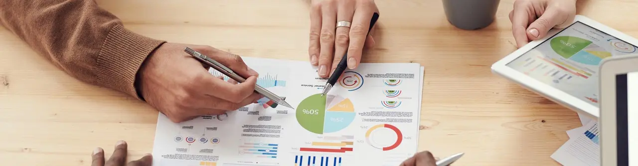 Insurance professionals collaborating on long-term care policy strategies
